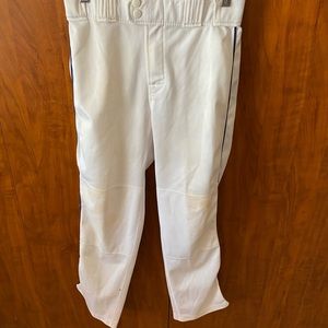 Rawlings Hemmed Baseball Pants with navy blue piping. Youth XL